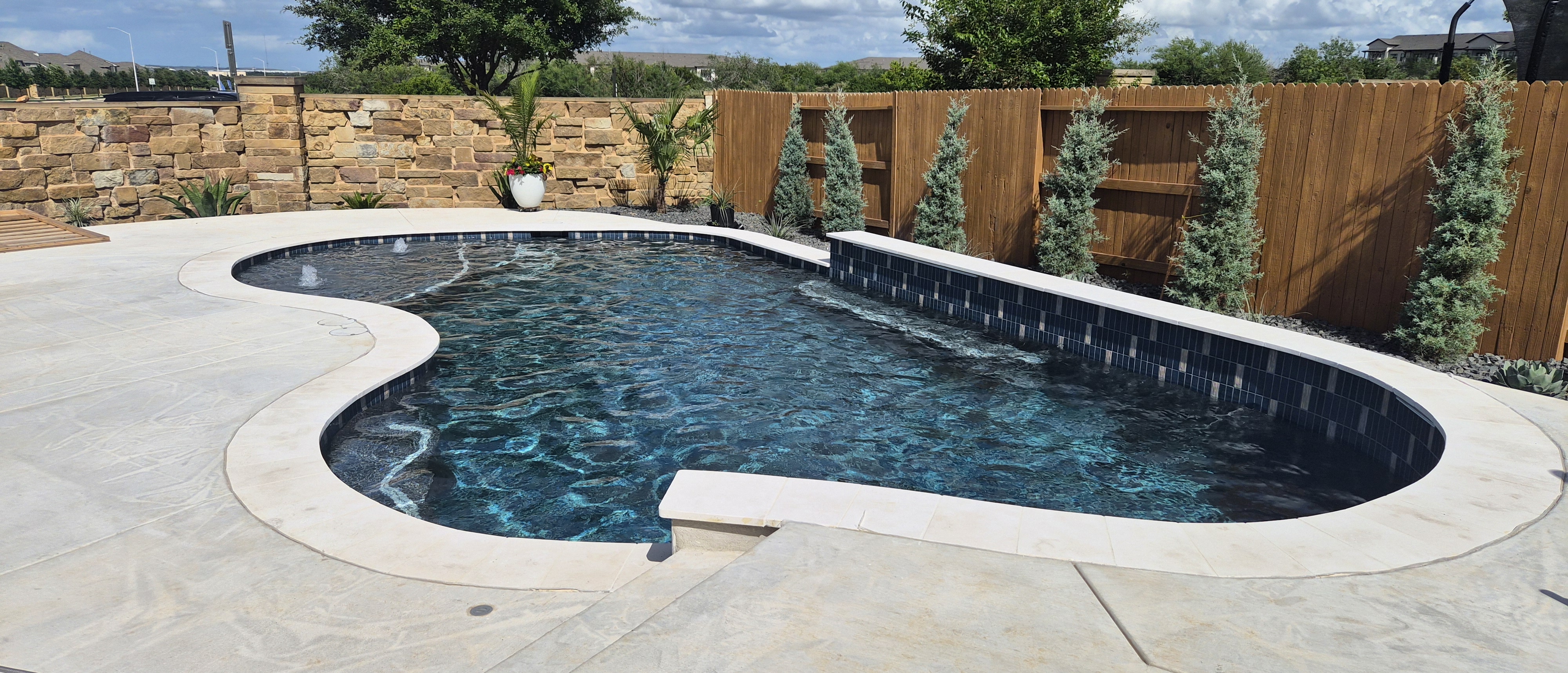 Custom pool financed and built by J. Oliver Pools in the Texas Hill Country